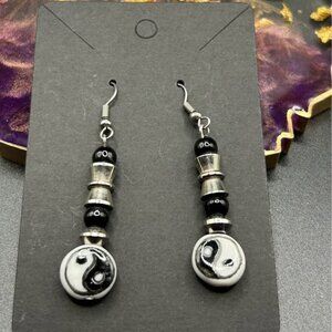 Ying and yang black bead costume earrings